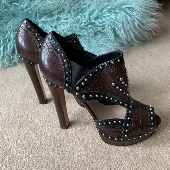 Prada Shoes - Prada ball bearing, cut out booties, size 10 Mint Condition.